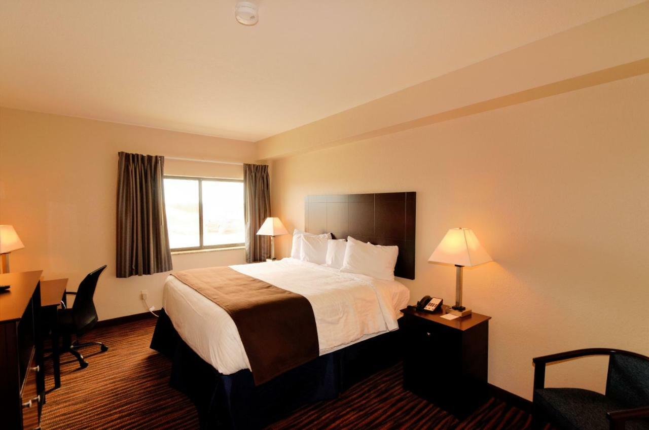 Cobblestone Inn & Suites - Denison | Oak Ridge Bagian luar foto