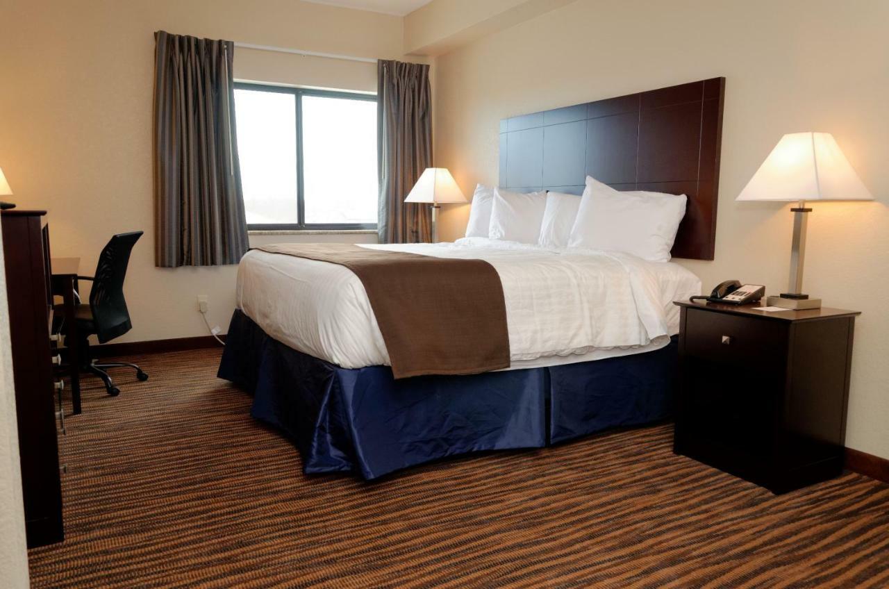 Cobblestone Inn & Suites - Denison | Oak Ridge Bagian luar foto